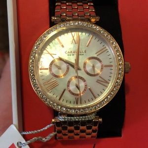 Caravelle watch with tags